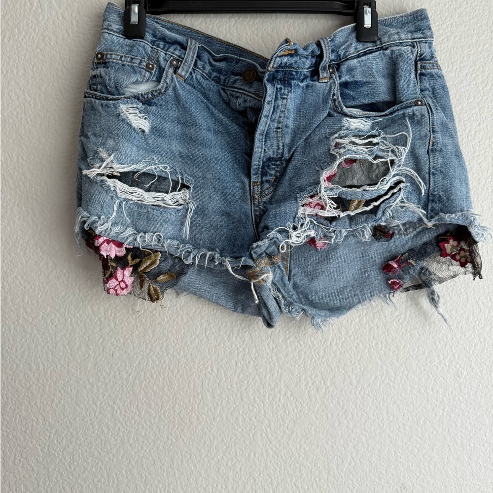 Free People Distressed Embroidered Light Wash Denim Shorts